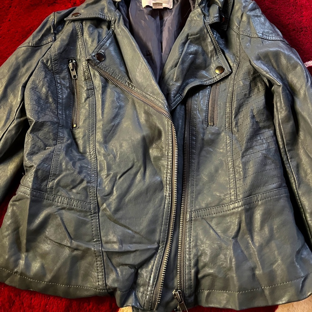 I am selling a leather jacket with zip off hood.